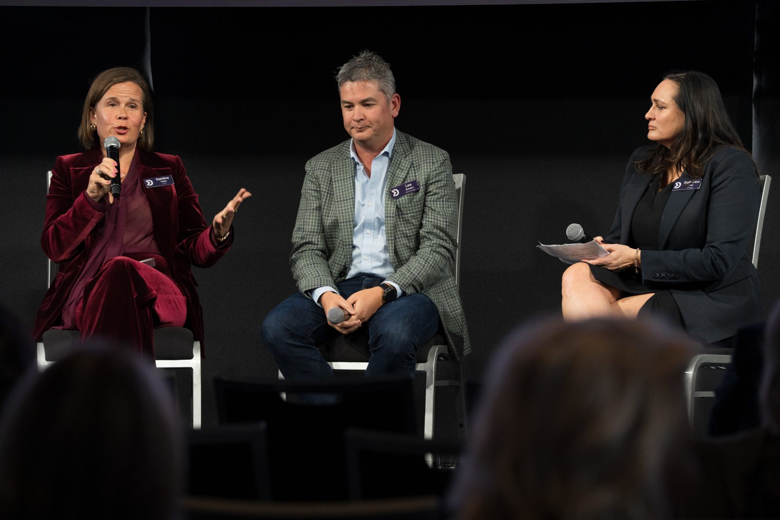Panel discussion on stage at a Sydney business conference