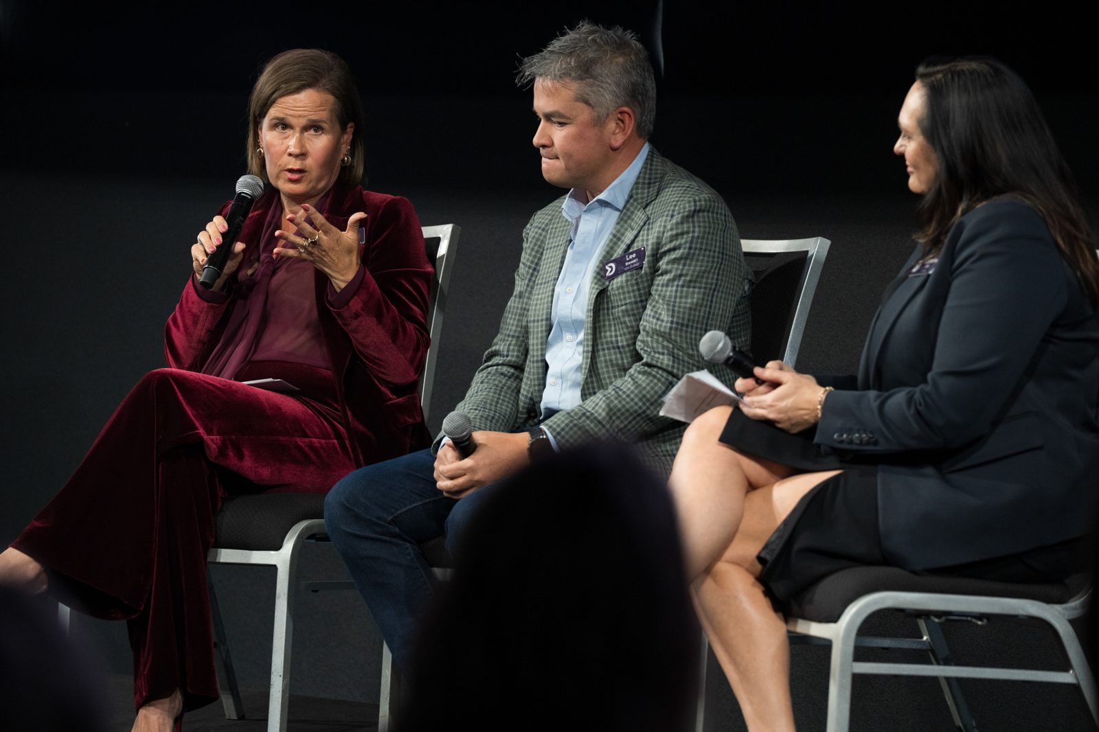 Panel discussion on stage at a Sydney business conference
