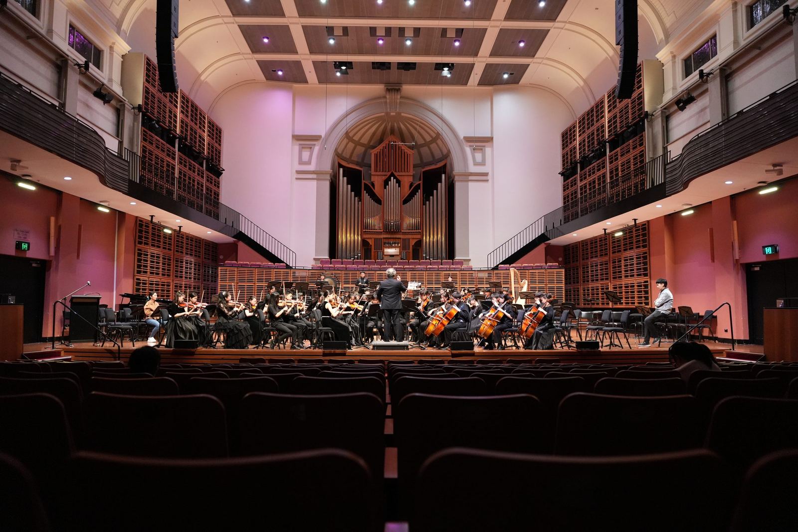 The hall and the orchestra from the back of the room
