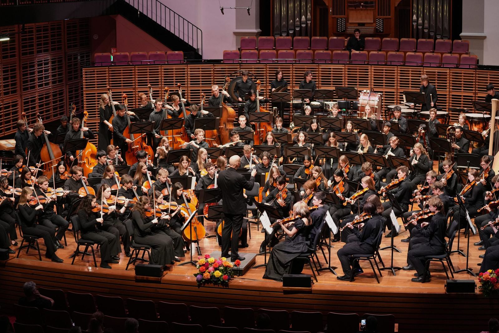 Orchestra on the concert platform from the gallery