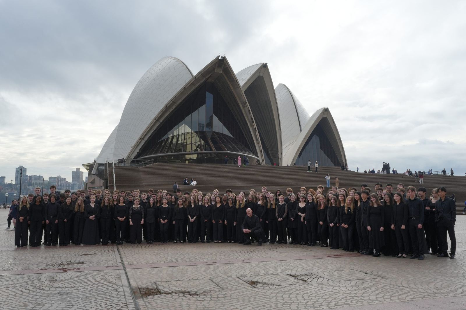 The ensemble lined up on the forecourt