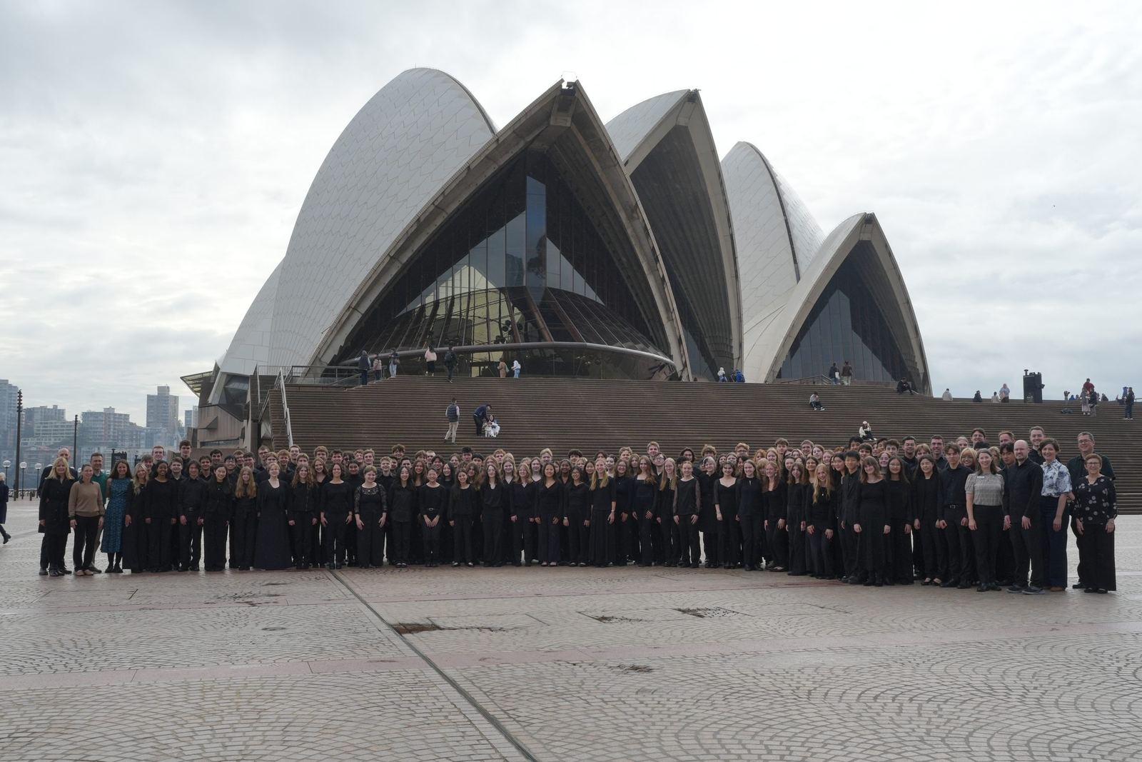 The ensemble on the forecourt under the sails